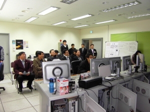 총사위선진지견학 